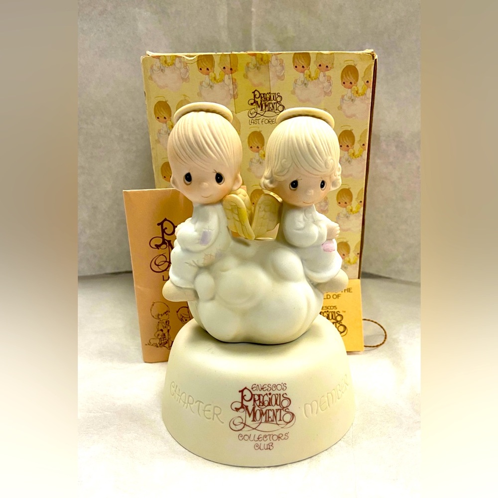 1979 Precious Moments Figurine. “But Love goes on Forever”